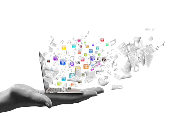 Close,Up,Of,Hand,With,Laptop,And,Media,Icons